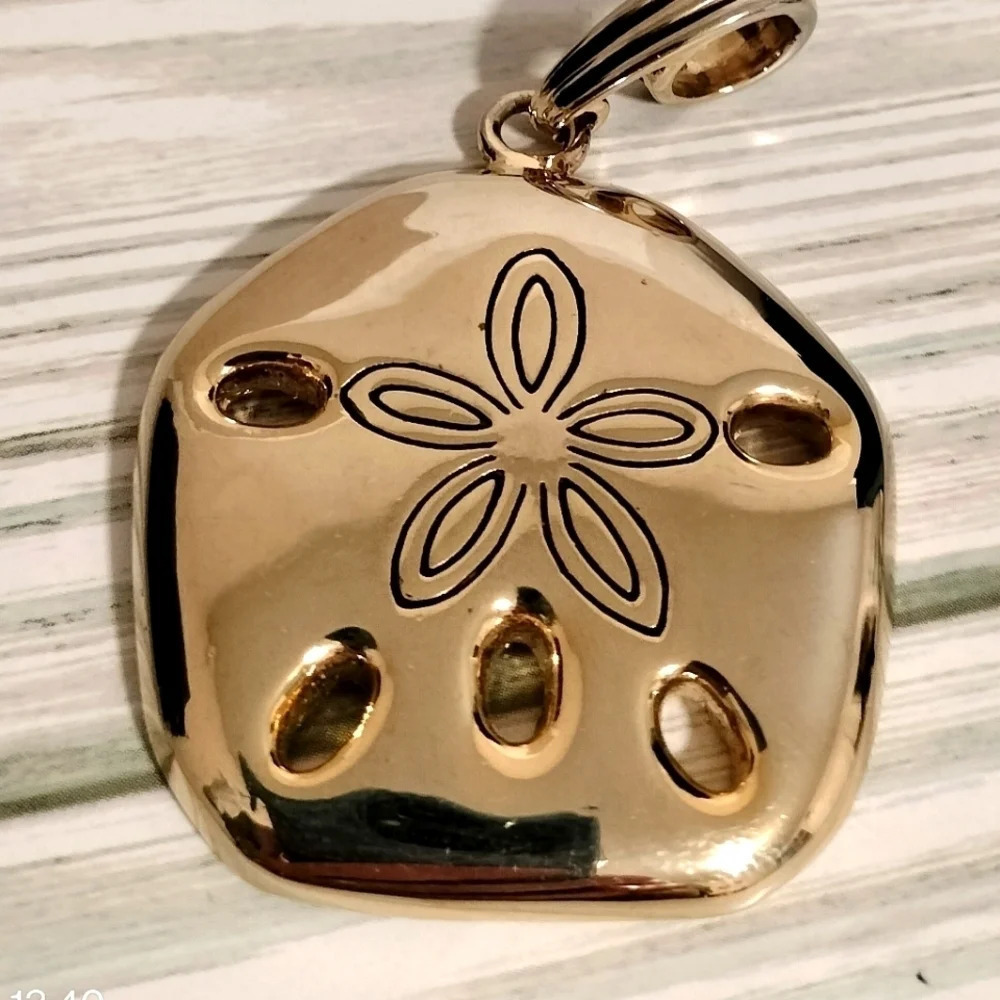 Unbranded light gold Tone Fashion Statement Floral Embossed Die cut pendant